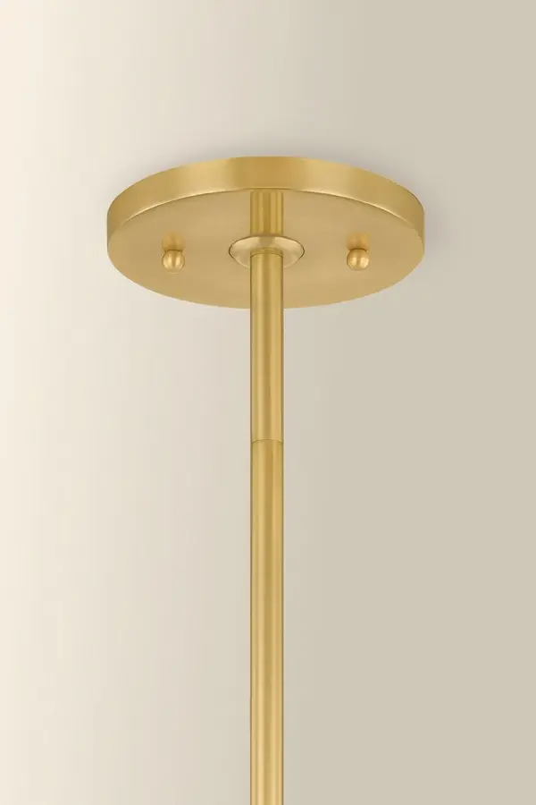 The Genevieve Chandelier enchants with its botanical-inspired design, featuring five gracefully unfurling arms topped with rosebud-shaped Cream Opal glass shades. The Aged Brass finish and scalloped fitter details evoke timeless Italian craftsmanship. - alternate view