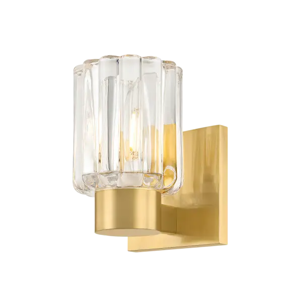 The Danae Bath Sconce brings sophisticated European design to your bathroom with its distinctive fluted glass shade inspired by Orrefors vases. The scalloped glass beautifully diffuses light while the clean metalwork adds refined elegance.