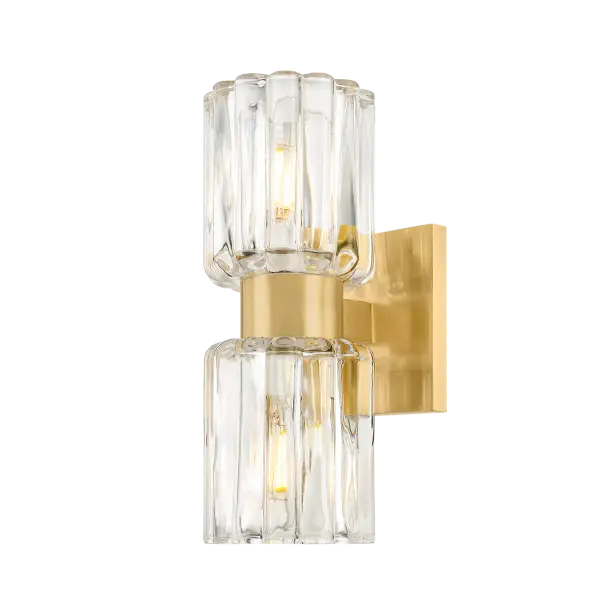 The Danae Bath Sconce brings sophisticated European design to your bathroom with its distinctive fluted glass shade inspired by Orrefors vases. The scalloped glass beautifully diffuses light while the clean metalwork adds refined elegance.