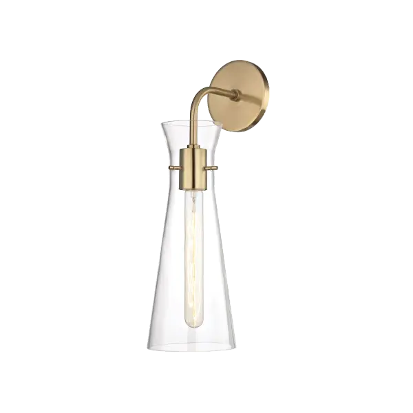 The Anya Wall Sconce combines classic elegance with contemporary simplicity. Its aged gold brass finish and glass globe shade create a sophisticated lighting solution perfect for bathrooms, hallways, and bedrooms.