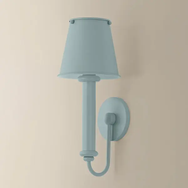 The Yara sconce combines elevated design with playful character, featuring a substantial candle sleeve, soft decorative accents, and a matching metal shade. Available in Dusk Blue, it brings color and personality to any space. - alternate view
