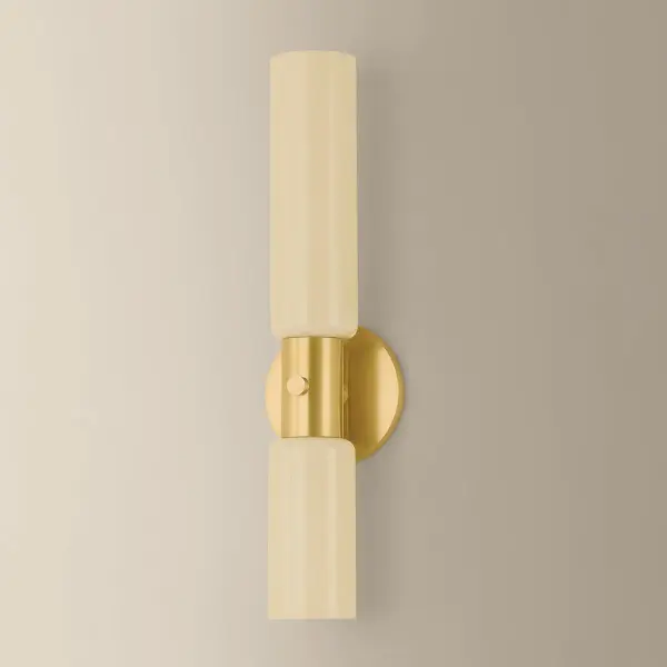 The Violetta wall sconce delivers refined elegance through its stacked cream opal glass shades and slim Aged Brass accent. Perfect for modern bathrooms and hallways seeking understated sophistication with warm ambient lighting. - alternate view