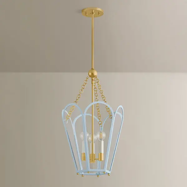The Clarisse Lantern reimagines traditional lantern styling with a hexagonal frame, arched glass panels, and a sophisticated mix of Aged Brass and Arctic Ocean finishes. Perfect for adding festive elegance to entryways and dining spaces. - alternate view