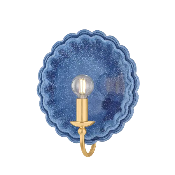 The Paulette sconce blends handcrafted ceramic artistry with heritage brass detailing. Its scalloped backplate and gooseneck arm create a sophisticated transitional look perfect for intimate spaces seeking refined character.