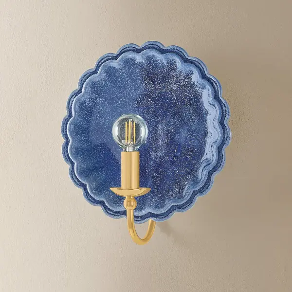 The Paulette sconce blends handcrafted ceramic artistry with heritage brass detailing. Its scalloped backplate and gooseneck arm create a sophisticated transitional look perfect for intimate spaces seeking refined character. - alternate view
