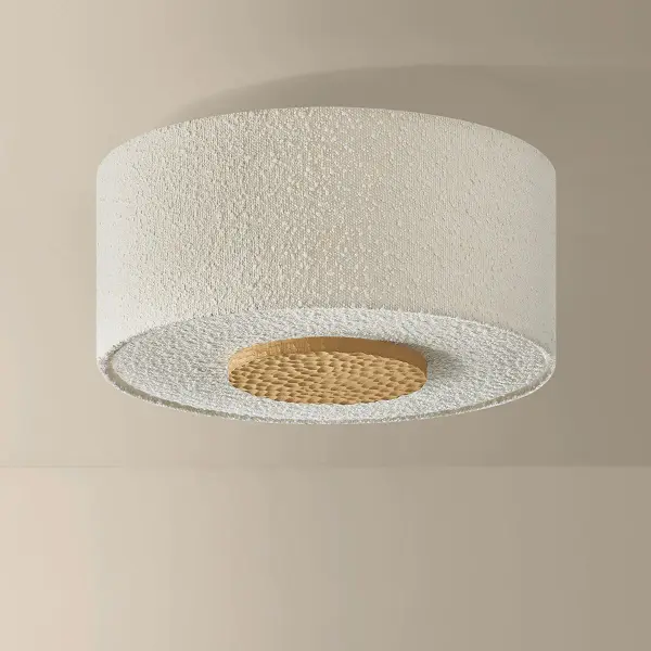 Leaning into cozy minimalism, the Miller family pairs warm neutrals with high textural contrasts. Accented by chiseled light beechwood and Aged Brass elements, the large ivory boucle drum shades create a soft, voluminous statement overhead. Depending on the ceiling height, Miller is available as a flush mount, semi-flush mount, or pendant, bringing a sense of artful ease to living and dining spaces. Part of our Hilary Matt x Mitzi Tastemakers collection. Due to the one-of-a-kind nature of the medium, exact colors and patterns may vary slightly from the image shown. Collection: Miller Designer: Hilary Matt Finish: Aged Brass Glass: Textured Linen Width: 18.00" Height: 10.25" Weight: 5.07 lb Canopy: 4.75"x0.50" Number of Bulbs: 3 Maximum Wattage: 15.00 W Bulb Type: A19 Bulb Base: E26 Medium Voltage: 120.00 V Material: Textile Country of Origin: VN Safety Listing: UL/cUL Safety Rating: Damp Manufacturer Warranty: 1 Year Limited Manufacturer Spec Sheet Instructions - alternate view