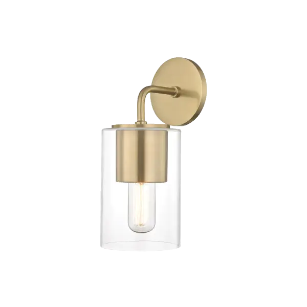 The Lula Wall Sconce combines classic design with modern sensibility, featuring a refined gold finish that adds warmth and sophistication to any space. Perfect for creating ambient lighting in bathrooms and hallways.
