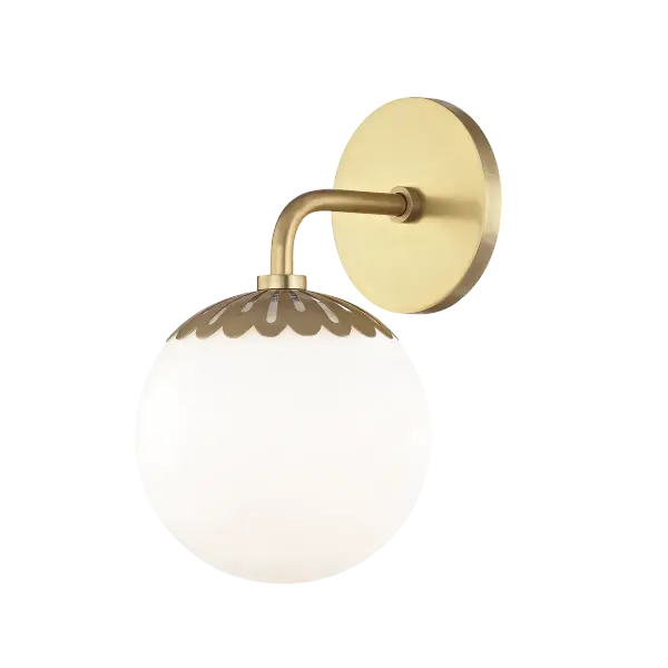 The Paige Bath and Vanity Light combines classic styling with contemporary finishes. Its aged brass construction and clean lines make it versatile for traditional and modern bathrooms alike.