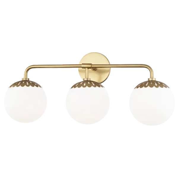 The Paige Bath and Vanity Light combines classic elegance with contemporary sensibility. Its gold finish and glass shades provide sophisticated illumination perfect for modern bathrooms and powder rooms.