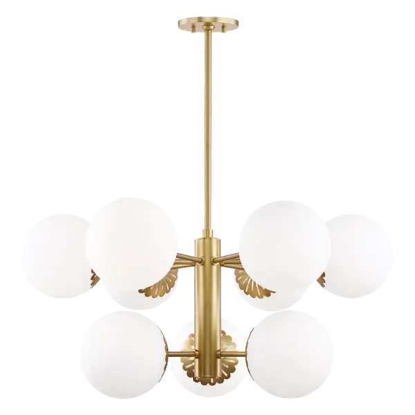 The Paige Chandelier combines classic elegance with contemporary sensibility, featuring an aged gold brass finish and glass globe shades. Perfect for creating a sophisticated focal point in dining rooms and entryways.