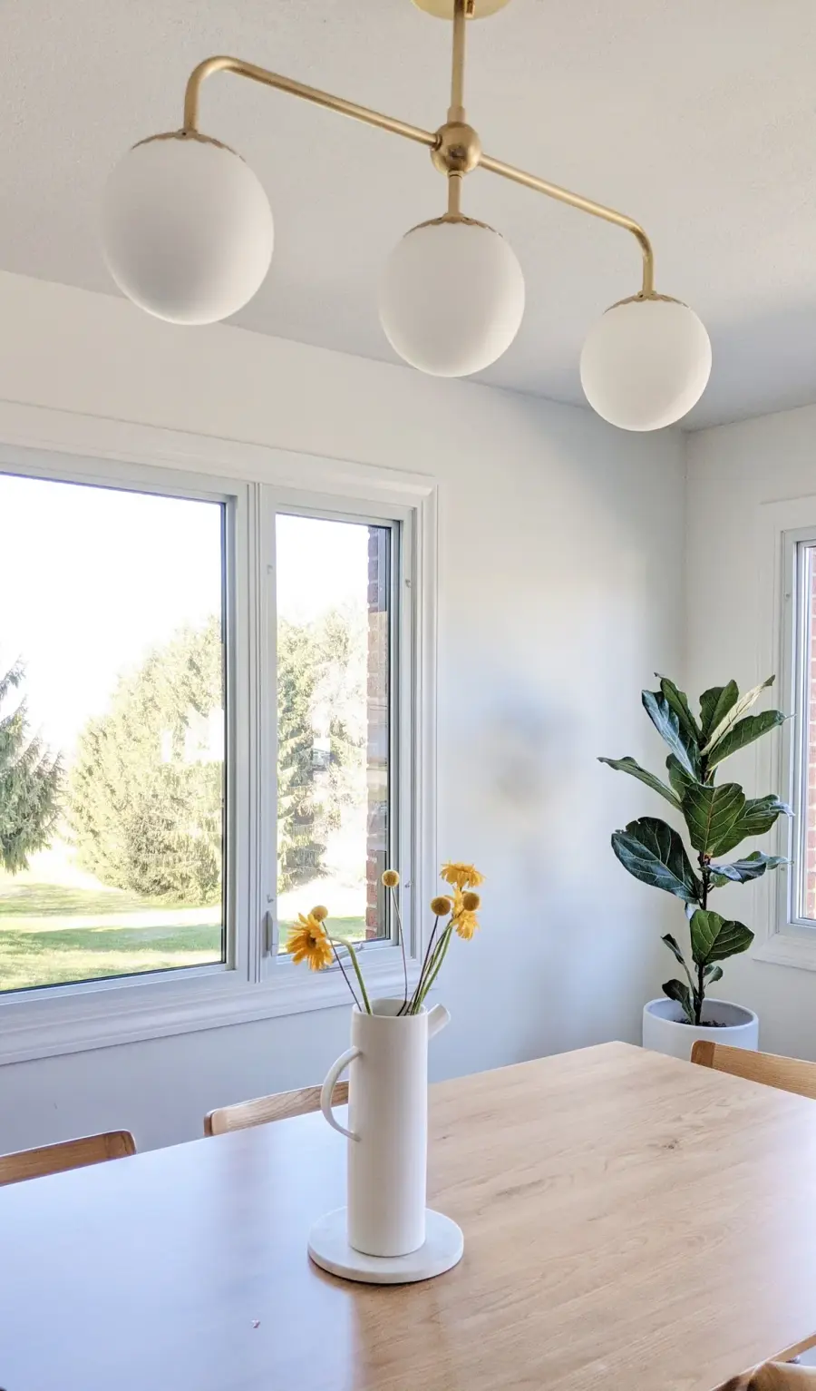 Elegant Linear Chandelier with Timeless Aged Brass Finish - Image 2