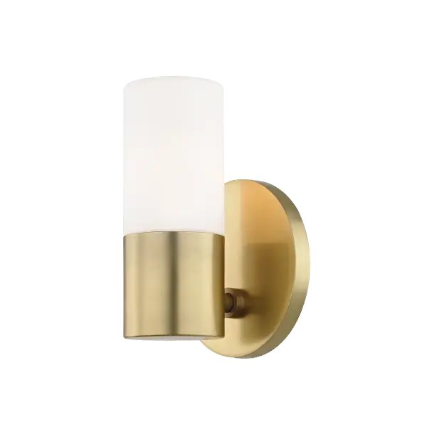 The Lola Wall Sconce combines transitional elegance with contemporary flair, featuring a sophisticated gold finish that enhances bathrooms, bedrooms, and hallways with warm, ambient lighting.