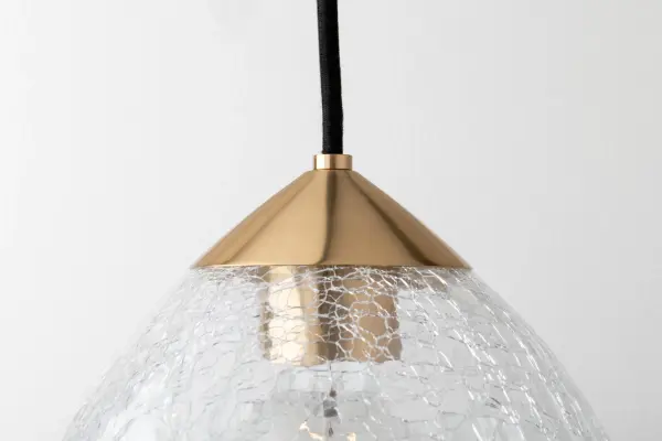 The Maya Pendant combines modern sophistication with timeless appeal through its aged gold brass finish and clean design. Perfect for adding refined elegance to dining spaces and kitchen islands. - alternate view