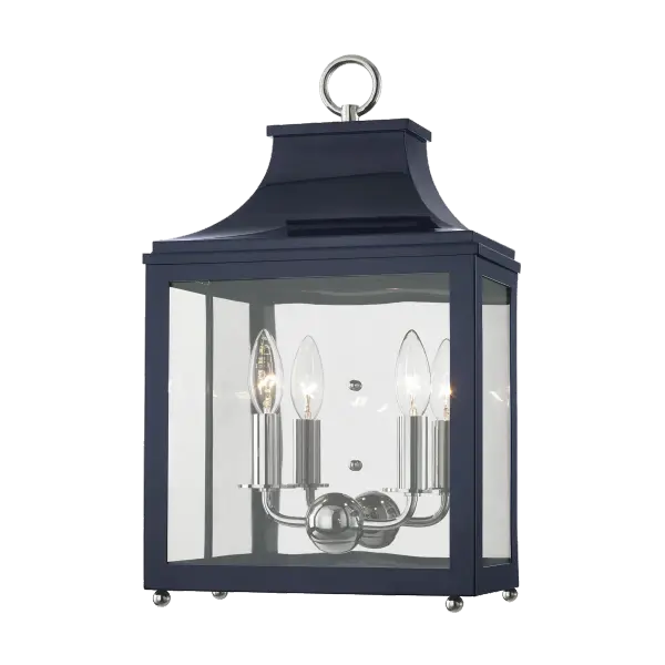 The Leigh Wall Sconce combines classic elegance with coastal charm through its polished nickel hardware and navy fabric shade. Perfect for adding refined ambient lighting to bedrooms, hallways, and living spaces.