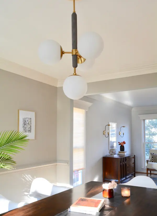 The Brielle Chandelier combines classic elegance with contemporary sensibility. Its aged gold brass finish and clean lines make it versatile enough for both traditional and modern interiors. - alternate view