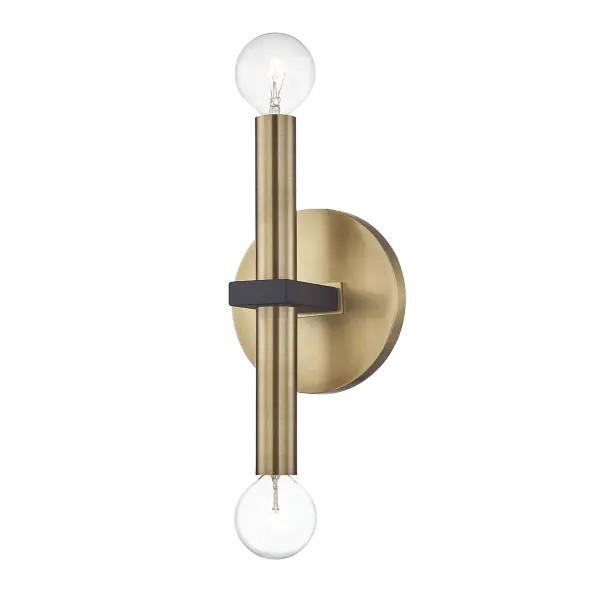 The Colette Wall Sconce combines aged brass warmth with modern black detailing for a sophisticated transitional look. Perfect for bathrooms, hallways, and bedrooms where refined lighting meets timeless style.