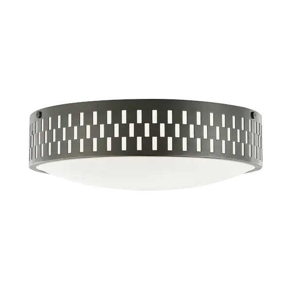 The Phoebe Flush Mount brings contemporary style with its unique perforated metal frame featuring geometric square and rectangle cutouts. This design allows light to escape from multiple angles, creating ambient illumination.