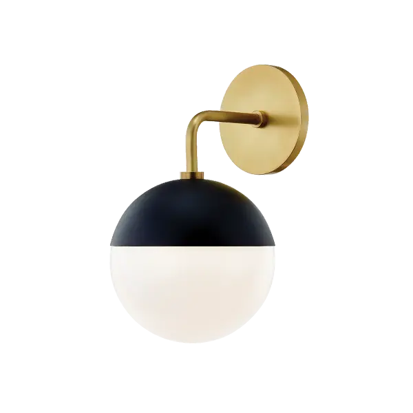The Renee Wall Sconce combines classic elegance with contemporary simplicity. Its aged gold brass finish paired with black accents creates a sophisticated look perfect for modern bathrooms and hallways.