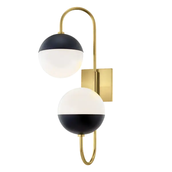 The Renee Wall Sconce combines aged brass and black finishes for a sophisticated look that works in both traditional and contemporary spaces. Its compact design makes it ideal for bathrooms, hallways, and accent lighting.