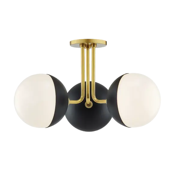 The Renee Semi Flush combines aged brass warmth with modern black detailing for a sophisticated transitional look. Its compact profile makes it ideal for rooms with lower ceilings while delivering ample illumination.