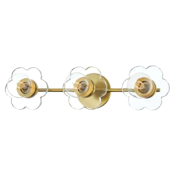 The Alexa Bath and Vanity Light combines classic elegance with contemporary sensibility. Its aged gold brass finish adds warmth and sophistication to bathroom spaces, while glass globes provide even, flattering illumination.