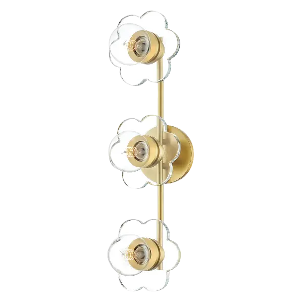 The Alexa Bath and Vanity Light combines classic elegance with contemporary sensibility. Its aged gold brass finish adds warmth and sophistication to bathroom spaces, while glass globes provide even, flattering illumination. - alternate view