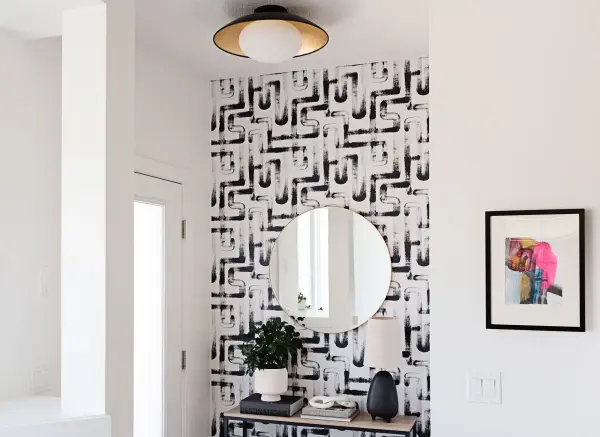 The Cadence Semi Flush combines modern black metal with glass accents for a refined ceiling fixture. Its low-profile design works well in spaces with standard ceiling heights while providing ample illumination. - alternate view