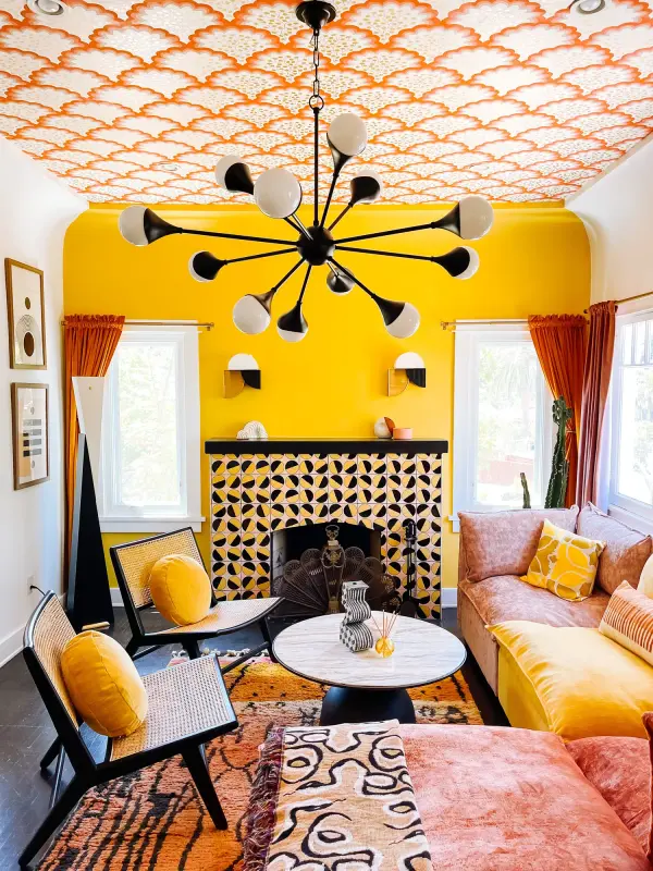 The Ariana Chandelier combines modern design with timeless elegance, featuring a sleek black finish that complements various interior styles. Perfect for dining rooms and entryways, this versatile fixture adds refined ambiance. - alternate view