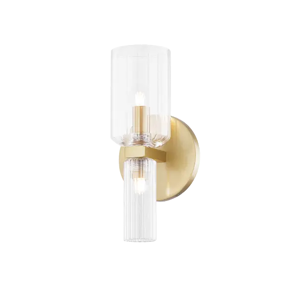 The Tabitha Wall Sconce combines classic design with contemporary sensibility. Its aged brass finish and glass globe shade create warm, inviting illumination perfect for intimate spaces and transitional interiors.