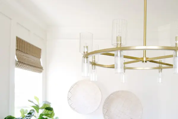 The Tabitha Chandelier brings traditional sophistication to any space with its aged gold brass finish. Perfect for dining rooms and entryways, this fixture combines classic design with versatile styling. - alternate view