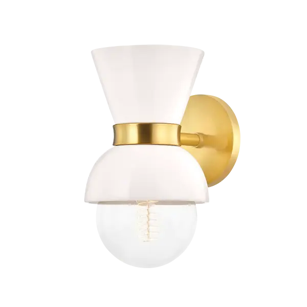 The Gillian Wall Sconce combines youthful charm with sophisticated design through expertly-crafted ceramic shades in milky cream tones. Aged brass metal accents add warmth, making this fixture versatile for modern interiors.