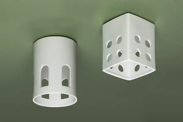 The Tatum Flush Mount brings desert modern aesthetics indoors with hand-crafted ceramic shades featuring perforations that create candle-like light patterns. Perfect for intimate spaces needing warm, ambient lighting. - alternate view