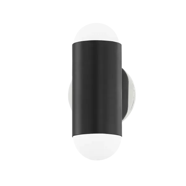 The Kira Wall Sconce combines polished nickel with soft black accents for a sophisticated contemporary look. Its compact design makes it ideal for bathrooms, hallways, and powder rooms where space is at a premium.