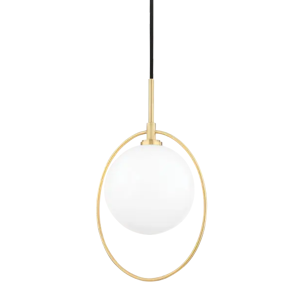 Babette is a cosmic-inspired pendant featuring an opal glass globe suspended within a thin brass ring. This sculptural piece masterfully balances contemporary design with minimalist aesthetics, creating an ethereal focal point.
