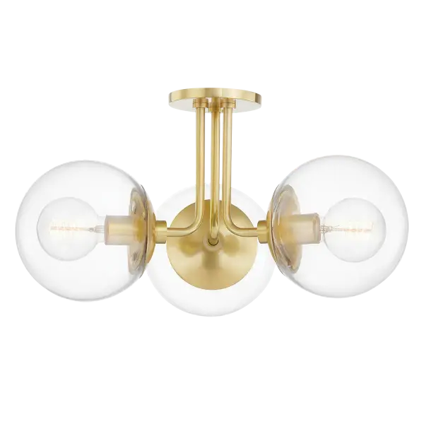 The Meadow Semi Flush combines aged gold brass metalwork with soft glass diffusion, creating a nature-inspired fixture perfect for spaces with lower ceilings. Its transitional aesthetic bridges traditional and contemporary styles.