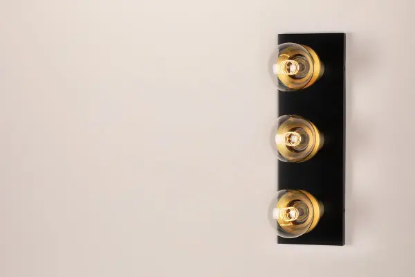 Brandi delivers edgy industrial style with exposed bulbs and high-wattage finishes. Perfect for adding sophisticated flair to bathroom vanities, this fixture balances retro charm with contemporary design. - alternate view