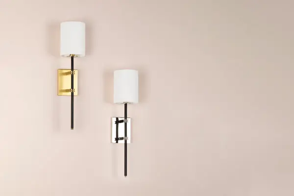 The Denise Wall Sconce combines polished nickel and black finishes for a sophisticated, modern look. Its compact design makes it ideal for bathrooms, hallways, and accent lighting applications. - alternate view