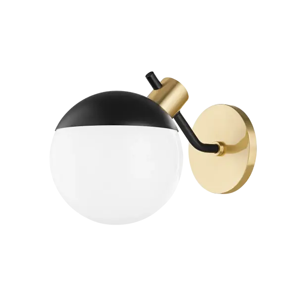 The Miranda Wall Sconce delivers bold modern style with its distinctive soft black frame and globe cap paired with aged brass accents. Perfect for adding sophisticated lighting to bathrooms, hallways, and bedrooms.