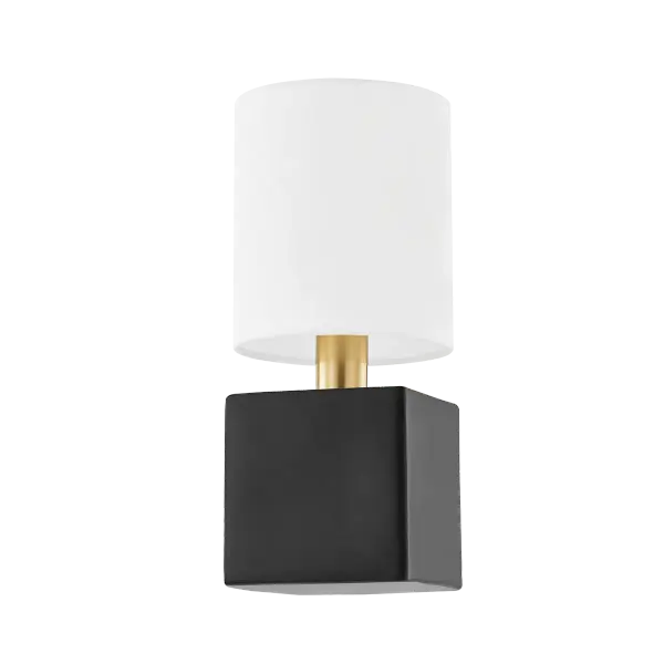 The Joey Wall Sconce combines clean geometric forms with transitional styling. Its ceramic base and white linen shade create a sophisticated yet approachable look perfect for modern and traditional spaces alike.
