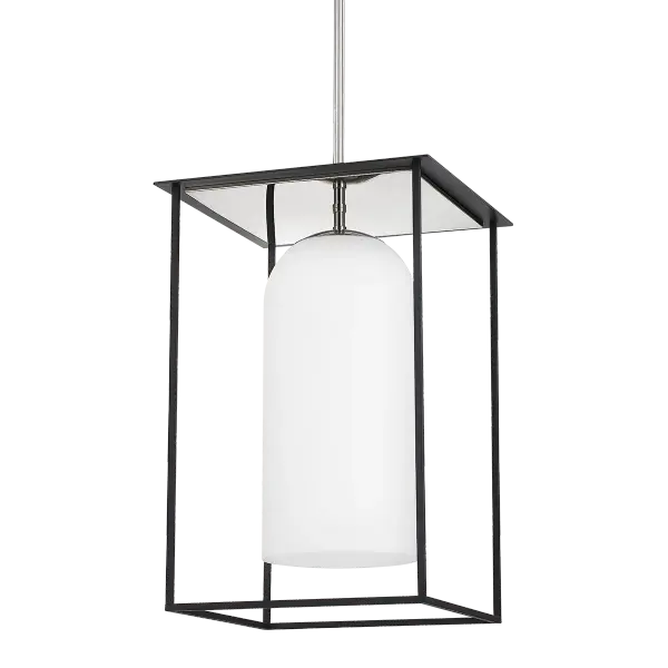 The Teres Pendant reimagines traditional lantern lighting with a contemporary twist. Its floating opal cylinder within a textured black cage creates dramatic visual interest while providing excellent ambient illumination.