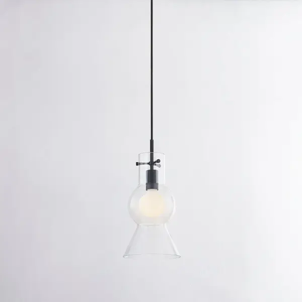 The Mirabel Pendant combines a distinctive totem-shaped glass shade with sleek soft black hardware for a conversation-starting fixture that works in multiple settings. Its simplistic yet intriguing form adds visual interest without overwhelming spaces. - alternate view