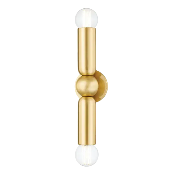 The Lolly Wall Sconce makes a statement with sleek curves and minimalist design. Its aged brass finish adds warmth while the industrial-modern aesthetic commands attention in any space.