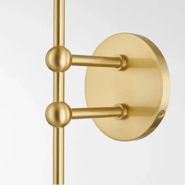The Ophelia Wall Sconce combines aged brass with iridescent glass globes for an otherworldly aesthetic. Its contemporary design adds softness and visual interest to any space, making it perfect for modern interiors. - alternate view