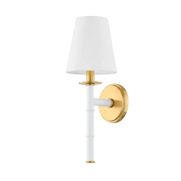 The Banyan Wall Sconce features an abstracted bamboo design inspired by Henry Link Bali Hai furniture, offering organic style in aged gold brass with soft white finish. Perfect for adding natural appeal without overwhelming your space.