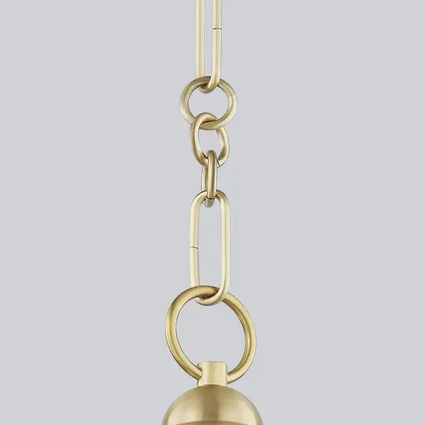 The Fenimore Pendant combines classic conical form with refined details like an elegant shade topper and intricate chainwork. Part of a designer collaboration, it features a unique Soft Blue exterior finish paired with warm Aged Brass interior for sophisticated ambient lighting. - alternate view