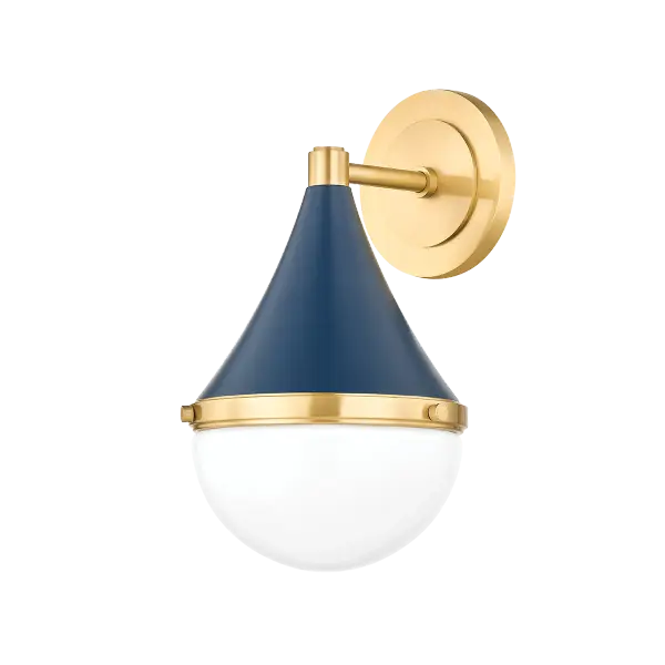 The Ciara Wall Sconce reimagines classic nautical design with a contemporary twist. Its teardrop silhouette combines a conical metal shade in refined Soft Navy with an opal glass diffuser, separated by an Aged Brass band.