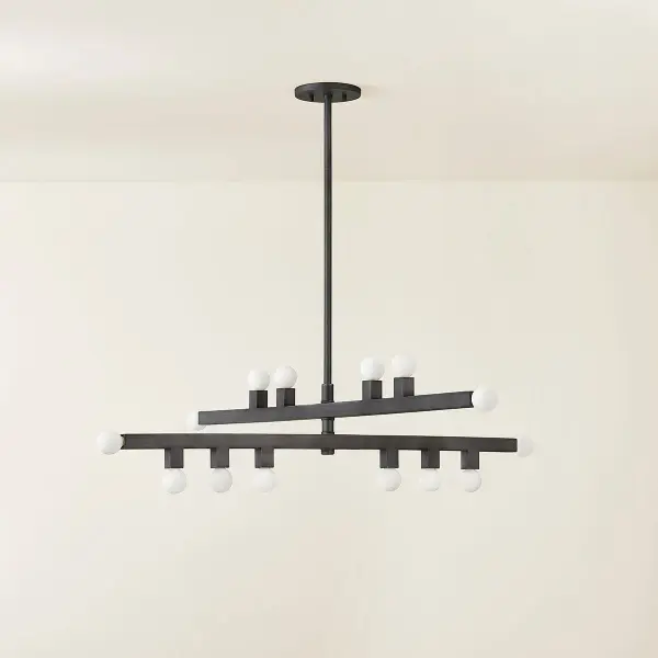 The Sutter Chandelier brings artistic sophistication with its asymmetrical glass orb arrangement along a sleek linear frame. Inspired by Mondrian's geometric compositions, it balances modern minimalism with decorative interest. - alternate view