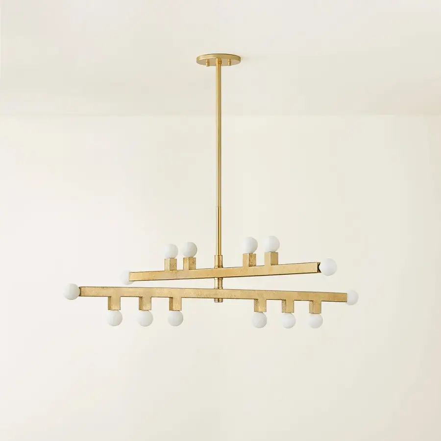 Modern Asymmetry Meets Warm Elegance in Glass and Gold - Image 3