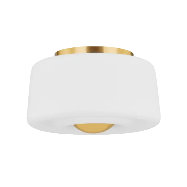 The Ciela Flush Mount combines artistic design with functional lighting through its deeply grooved opal glass shade that creates ripple-like patterns. The oversized dome finial adds sculptural interest while the aged brass finish provides warmth.