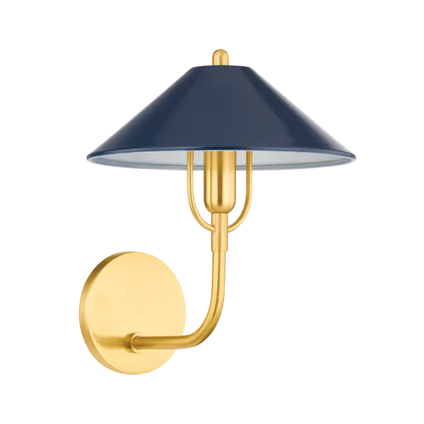 The Mariel Wall Sconce beautifully bridges traditional and modern design with its distinctive curved harp detail and sophisticated Aged Brass finish paired with a Soft Navy metal shade. Perfect for adding refined ambient lighting.